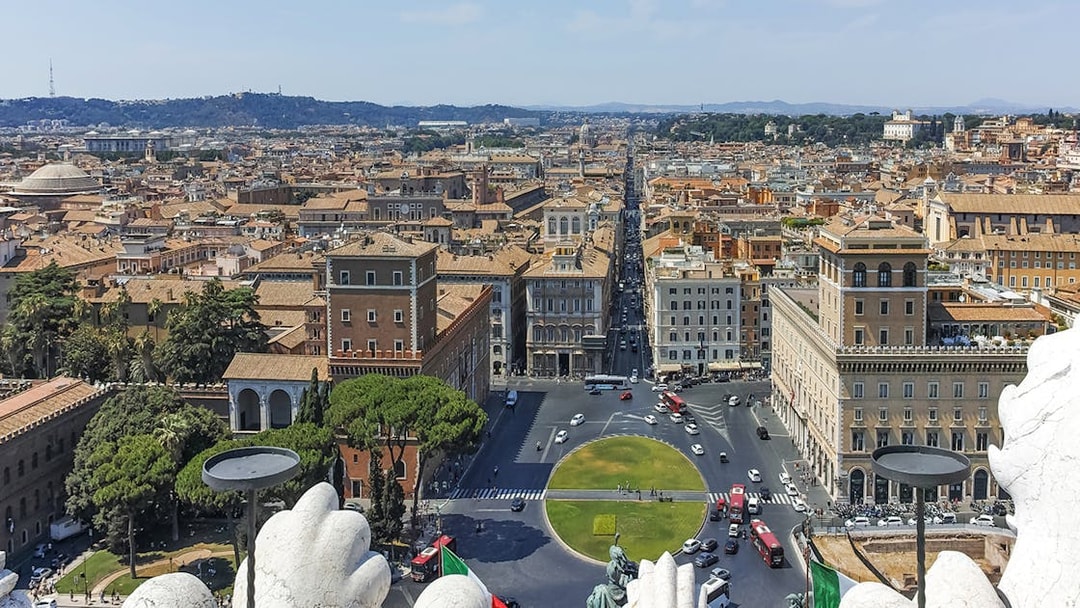 View of Rome from the Altar of the Fatherland, showcasing cityscape and historic buildings.