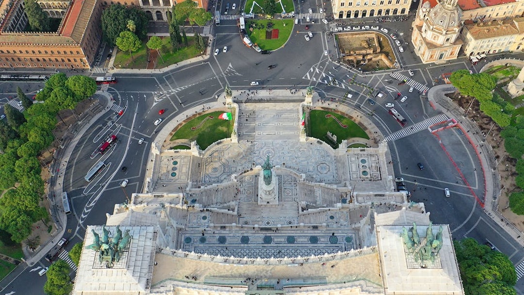 Aerial view of Altare della Patria in Rome, showcasing the monument and surrounding streets.