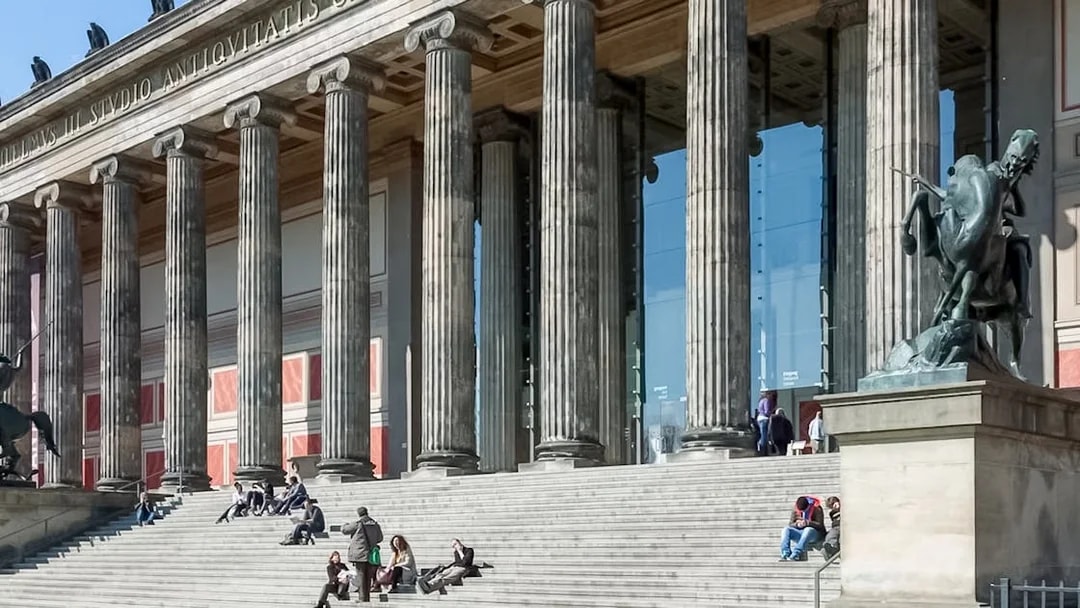 Altes Museum entrance with visitors on steps, Berlin.