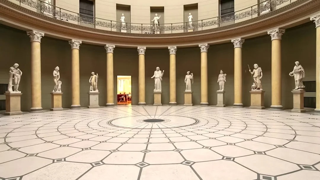 Interior of Altes Museum with classical statues and columns, Berlin.