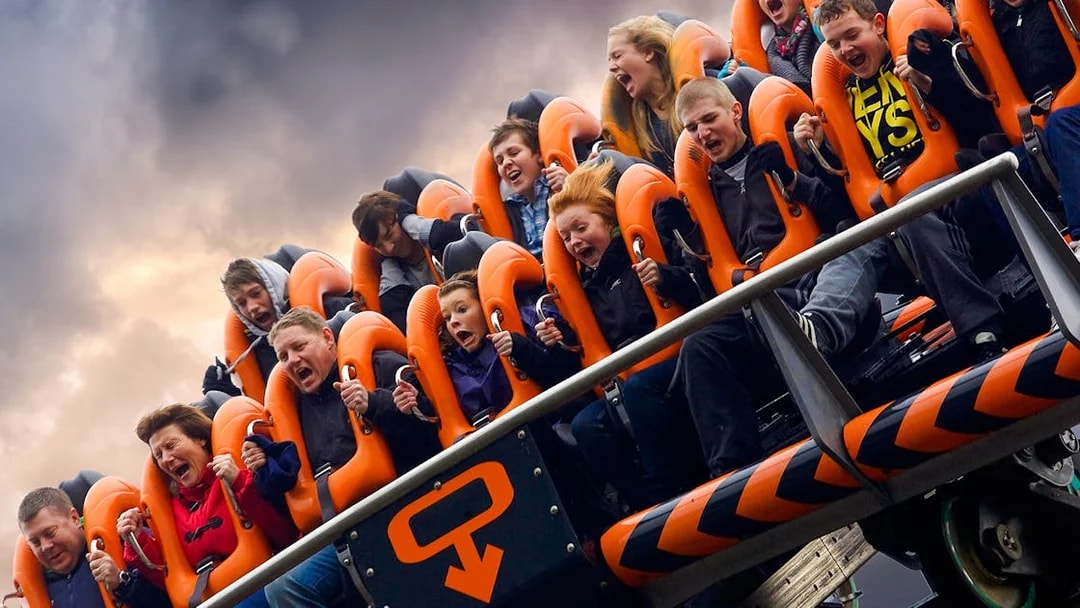 Riders experiencing the Oblivion roller coaster at Alton Towers.