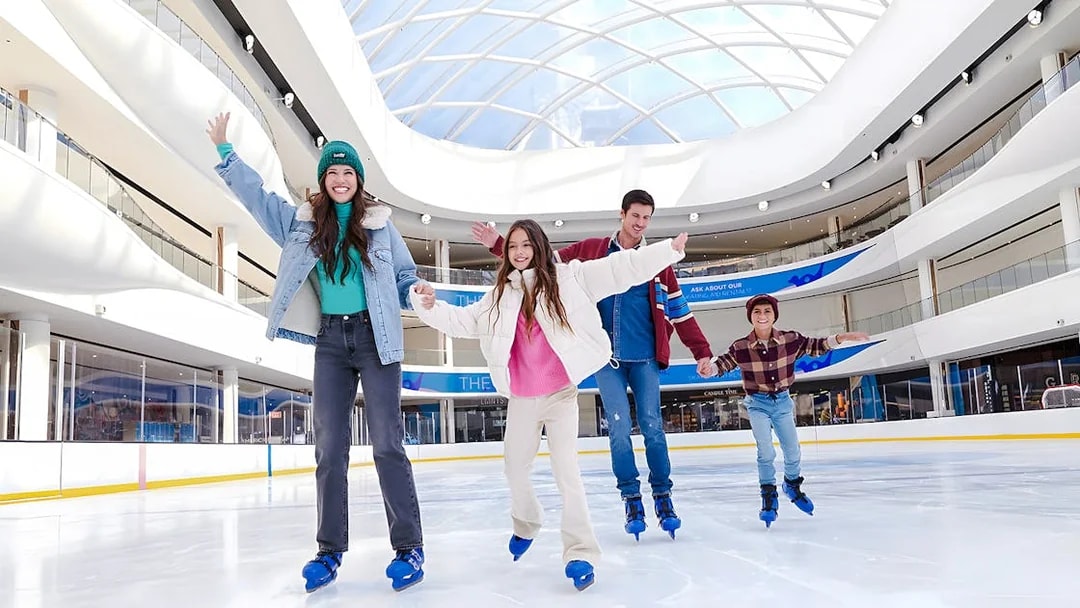 Family ice skating at the American Dream ice rink.