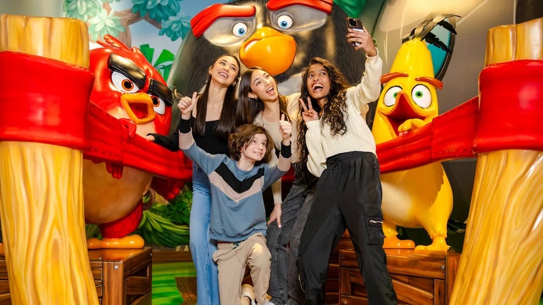 Guests taking a selfie at Angry Birds Mini Golf, American Dream Nickelodeon Universe.