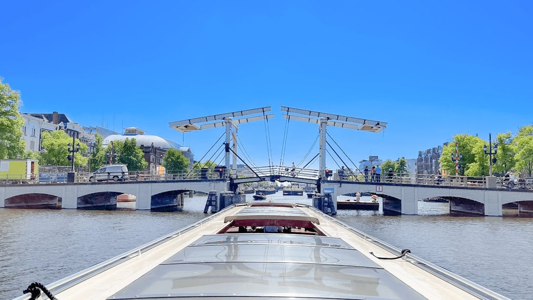 Boat approaching Amsterdam's Magere Brug on a canal cruise.