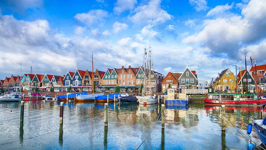 Marina and colorful waterfront houses in Volendam, Netherlands.