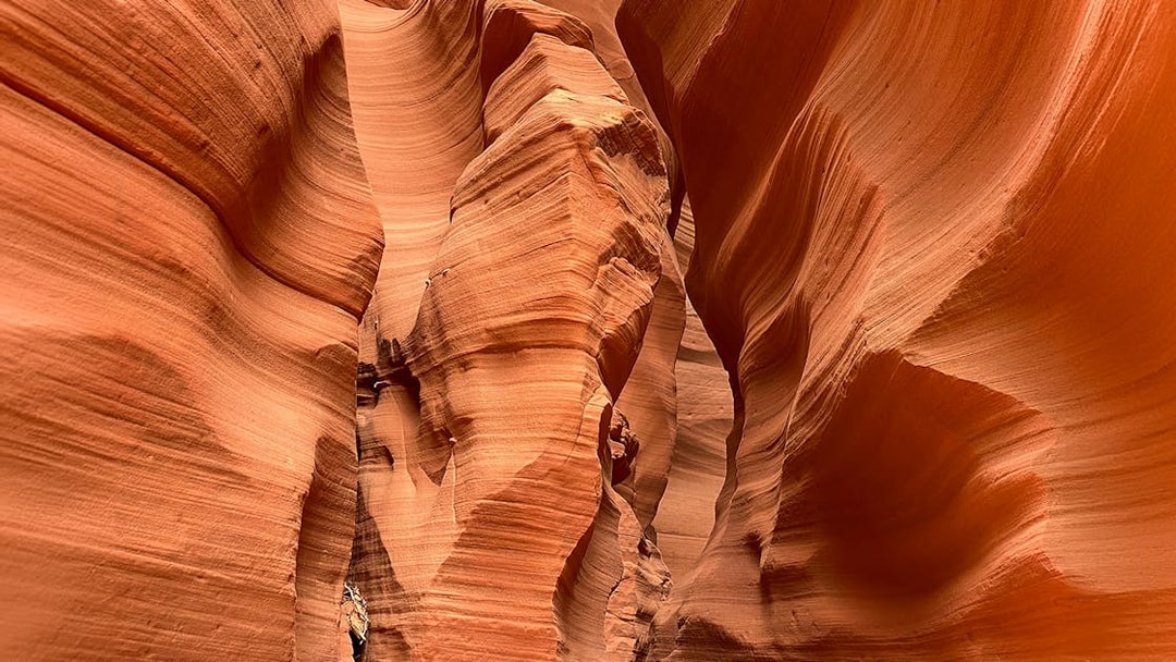 Antelope Canyon X sandstone formations with narrow passageways.