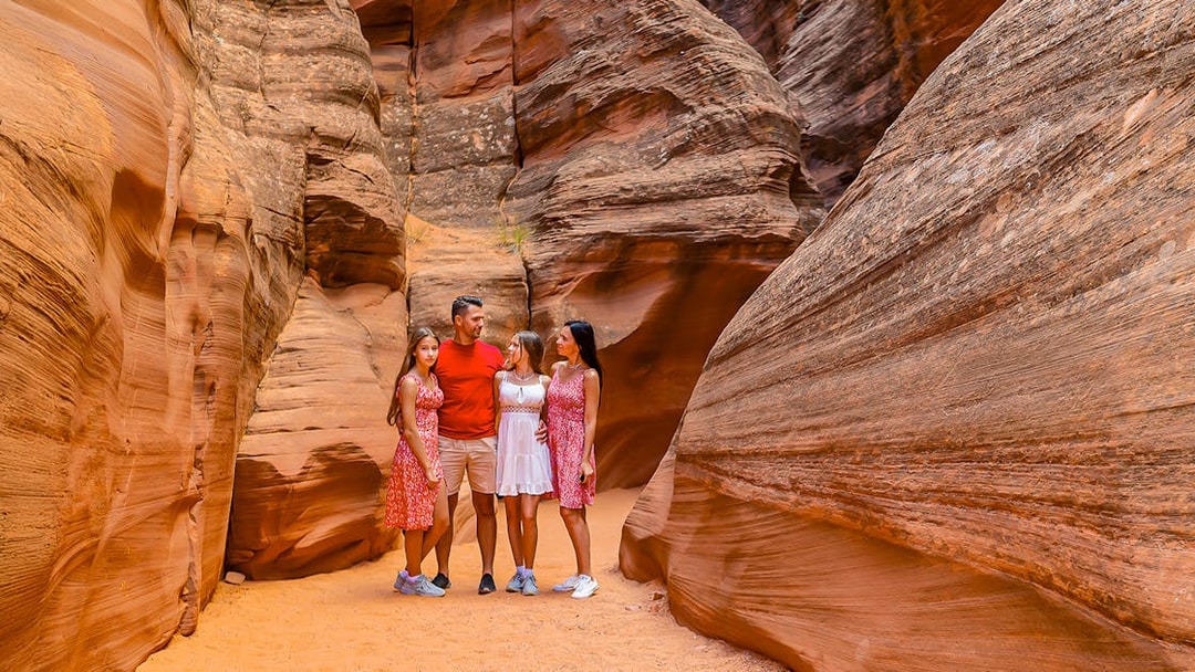 Group exploring Antelope Valley Canyon's sandstone formations on Ligai Si Anii Tour.
