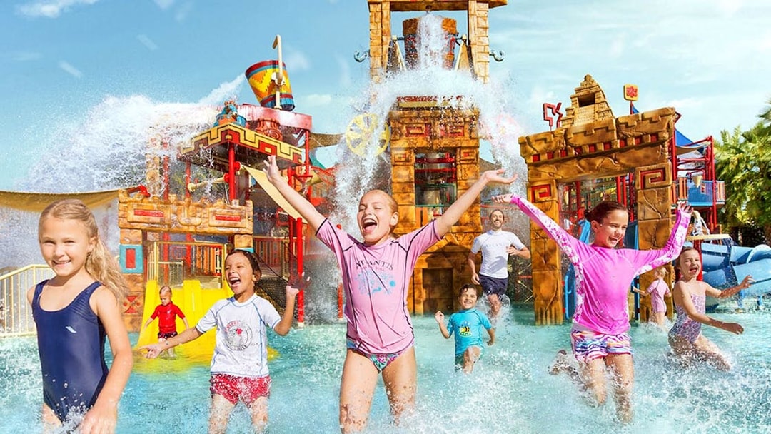 Kids enjoying Splashers ride at Atlantis, The Palm, Dubai waterpark.