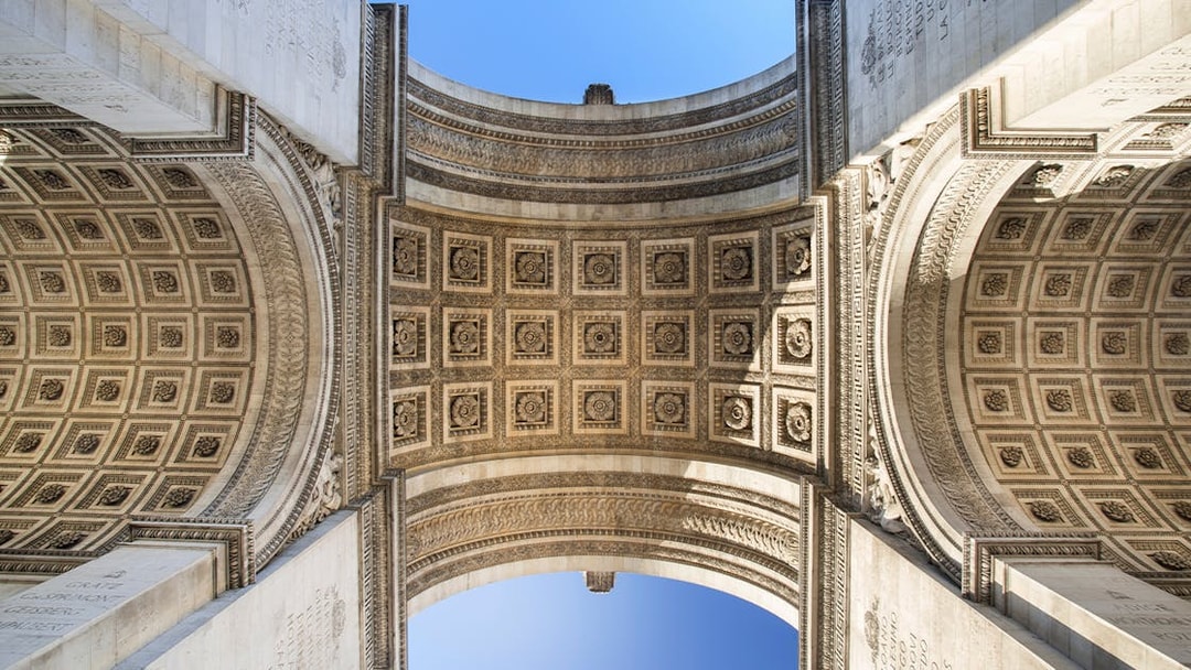 Intricate ceiling details of the Arc de Triomphe in Paris, France.