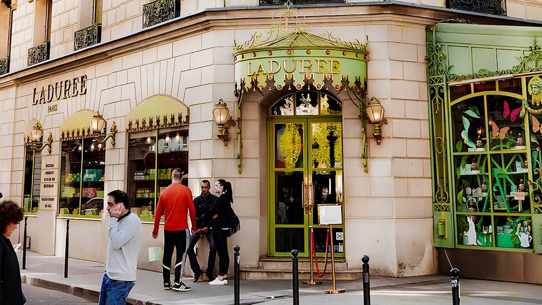 Ladurée storefront in Paris, part of the Arc de Triomphe walking tour with macaron tasting.