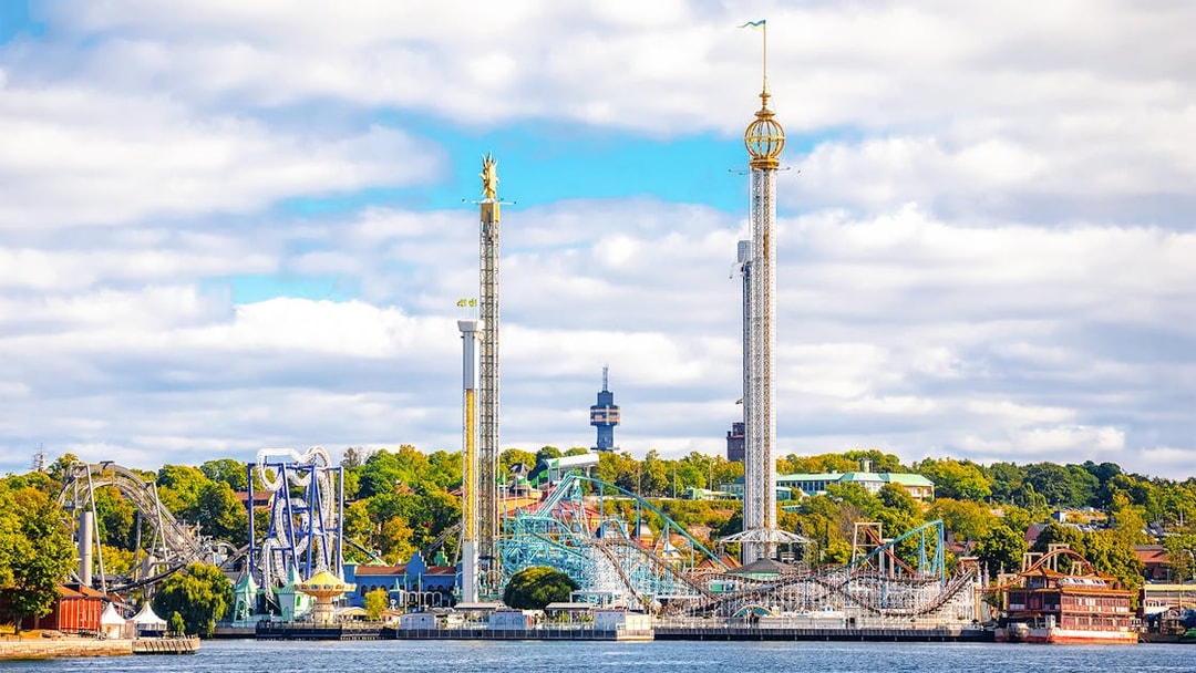 Gröna Lund amusement park with roller coasters and rides, Stockholm waterfront, Djurgrden City Canal Cruise.