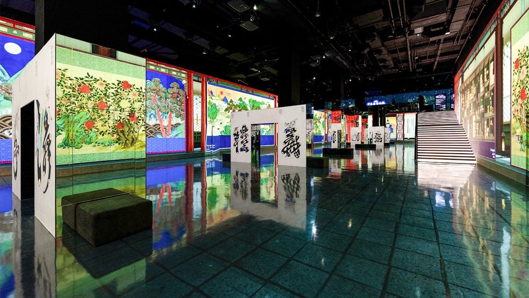 Arte Museum Dubai exhibit featuring vibrant Joseon paintings and calligraphy displays.