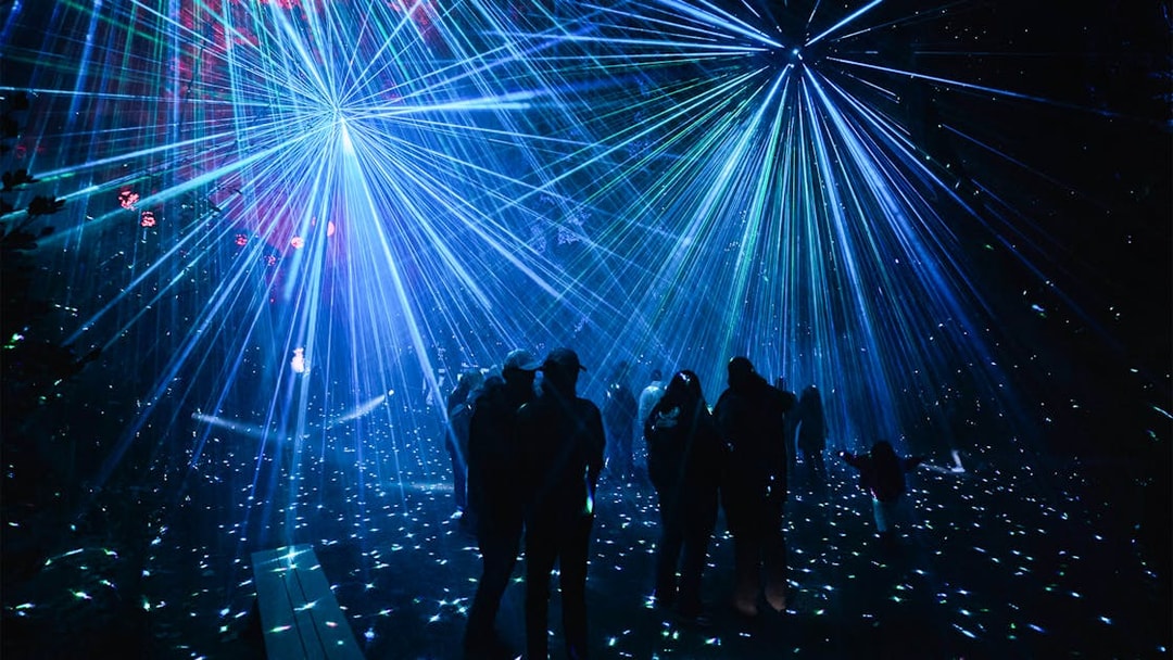 Visitors enjoying light show at Astra Lumina, Currumbin Wildlife Sanctuary.