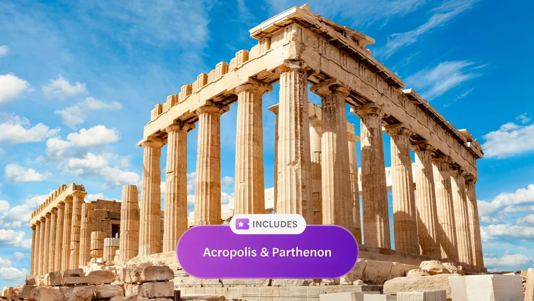Parthenon temple on Acropolis hill under blue sky in Athens, Greece.