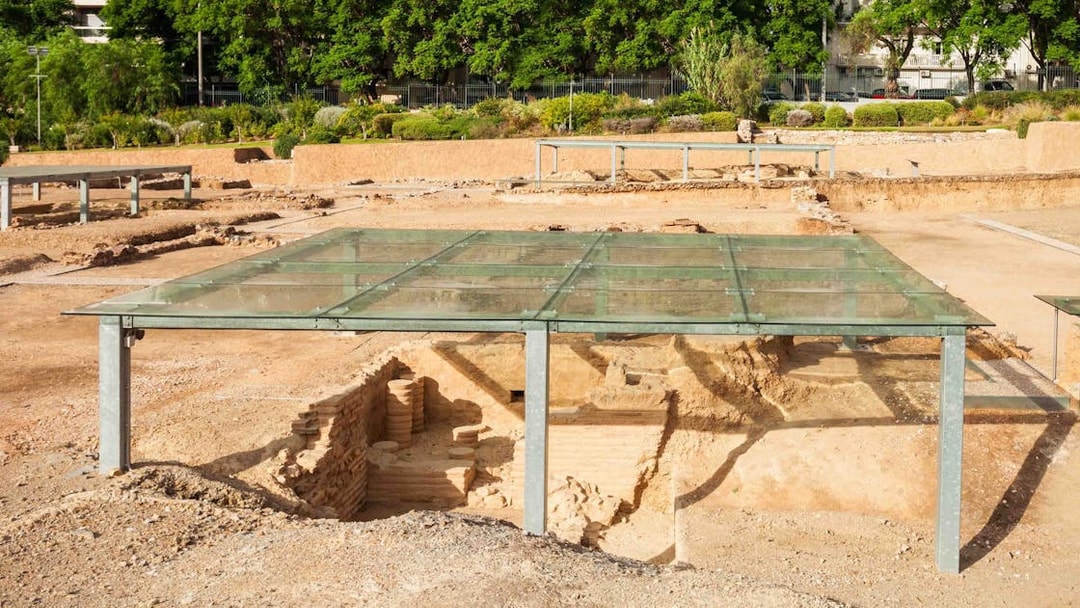 Ancient Roman ruins under glass cover in Valencia, Spain.