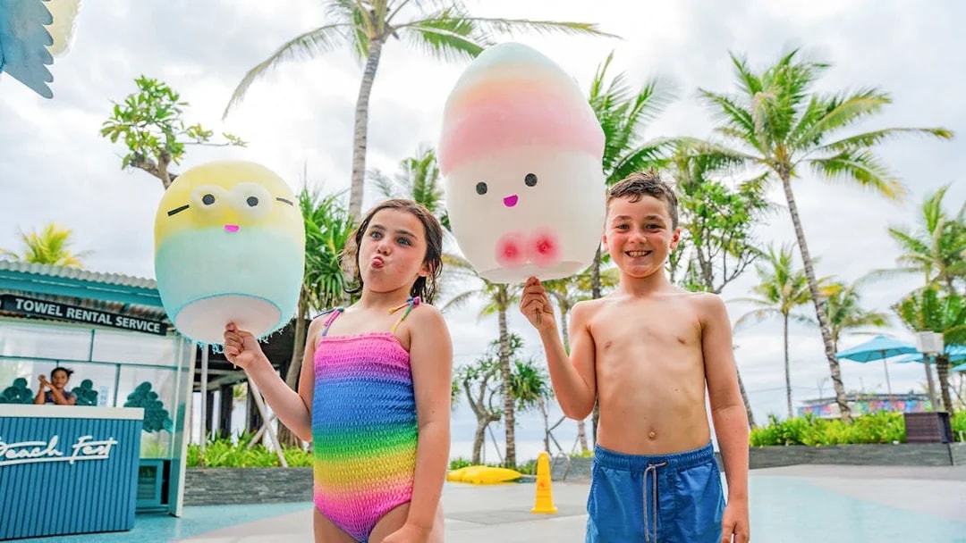 Kids holding cotton candy at Atlas Beach Club.