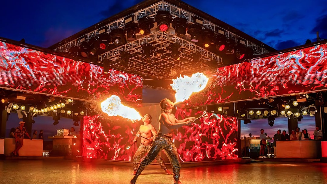 Fire performers at Atlas Beach Club, Bali during a cultural show.
