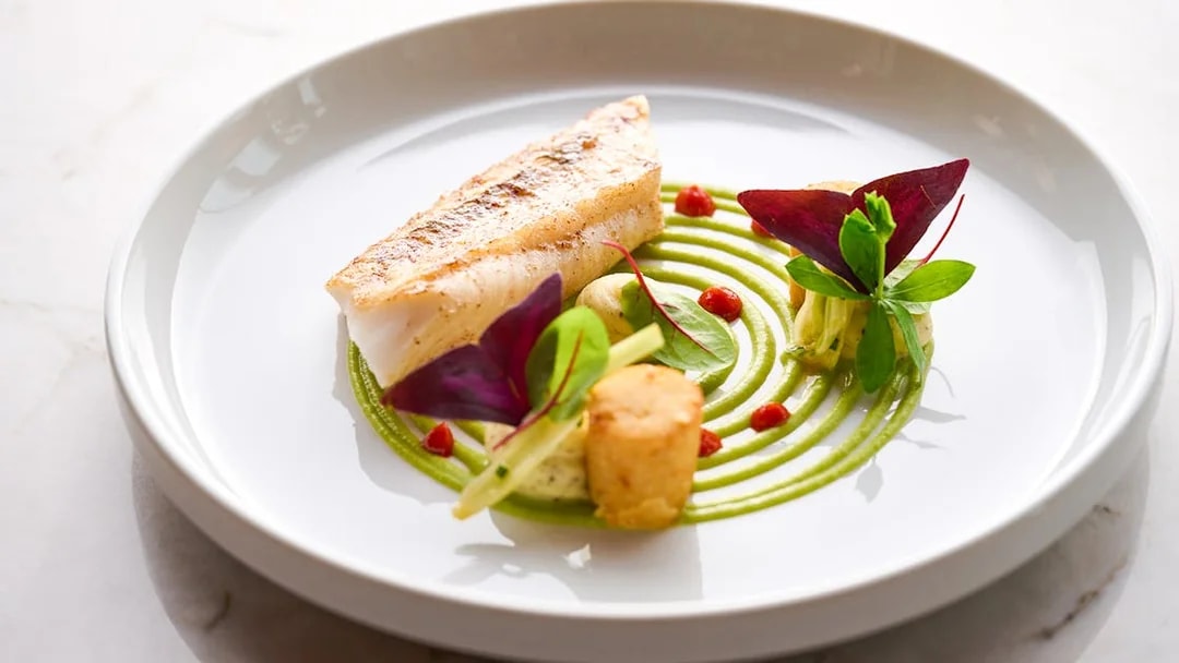 Seared fish with green puree and garnishes at At.Mosphere, Burj Khalifa.