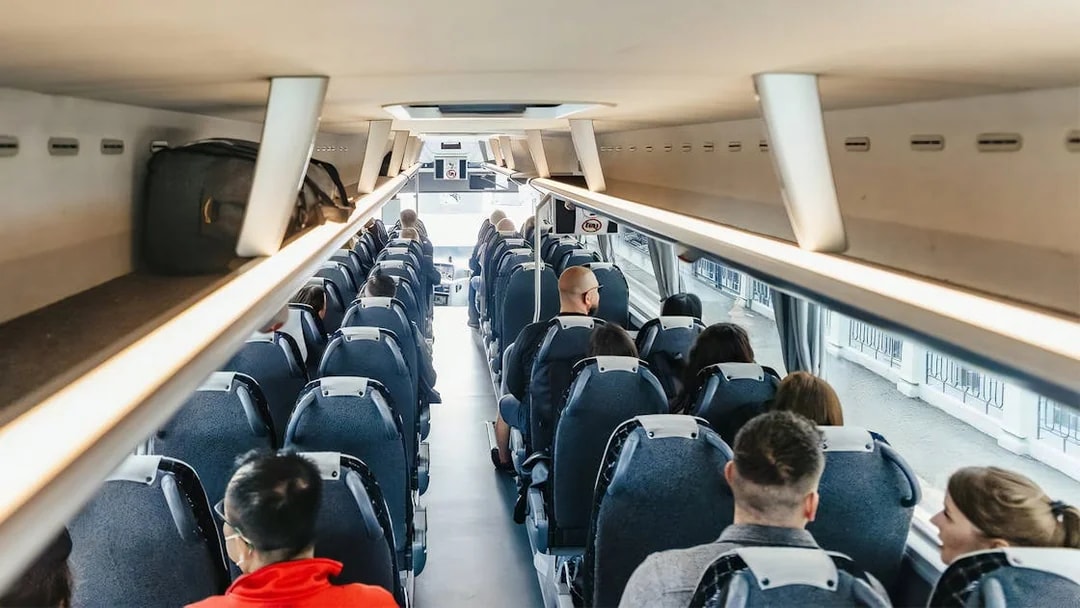 Passengers seated in ATVO airport transfer bus, Venice.