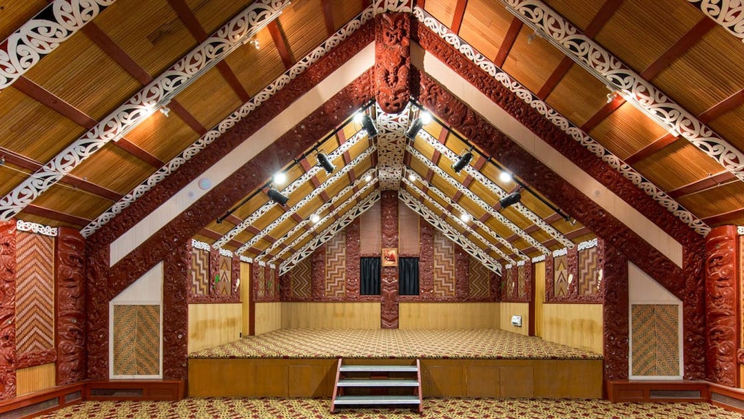 Traditional Māori meeting house interior at Te Puia, Rotorua, New Zealand.