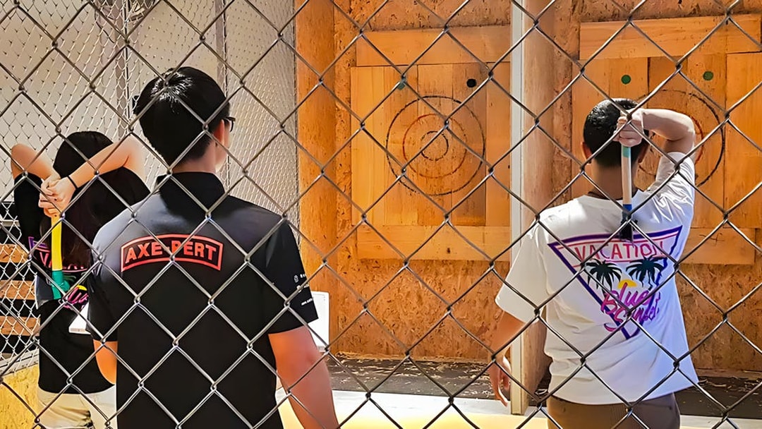 Participants axe throwing at Axe Factor in Sentosa.