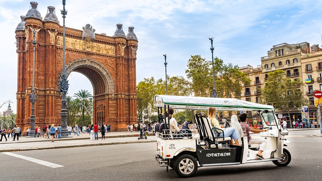 Tuk tuk tour near Arc de Triomf in Barcelona.