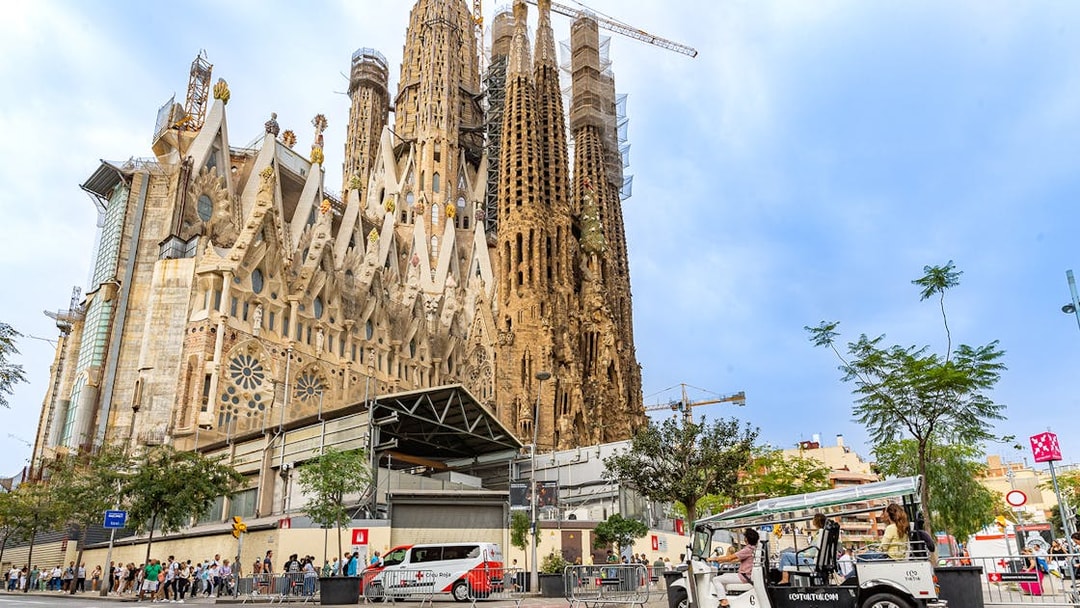 Tuk tuk in front of Sagrada Familia, Barcelona.