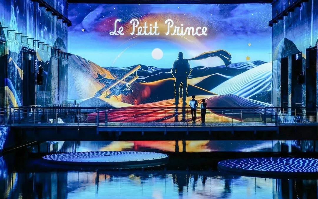 Immersive display of The Little Prince at Bassins des Lumières, Bordeaux.