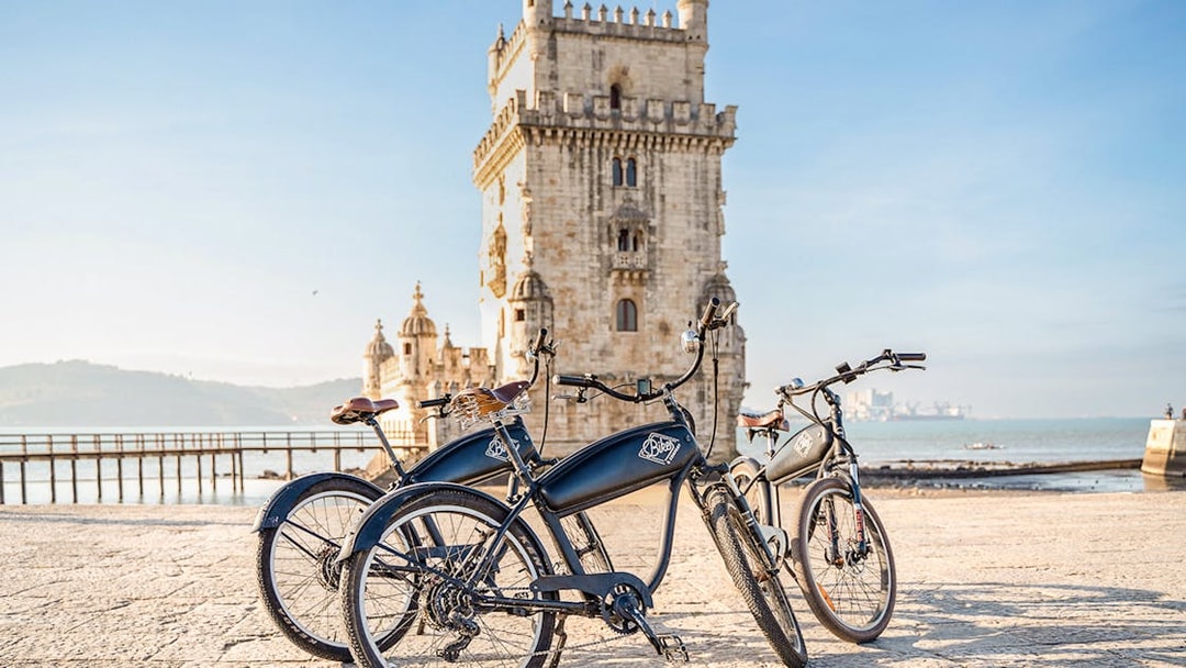 E-bikes parked near Belém Tower in Lisbon, Portugal.