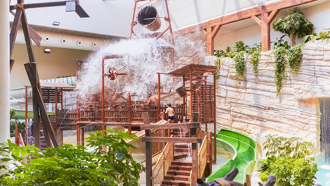 Children enjoying water play area at Aqua Fort, Bellewaerde Aquapark, Belgium.