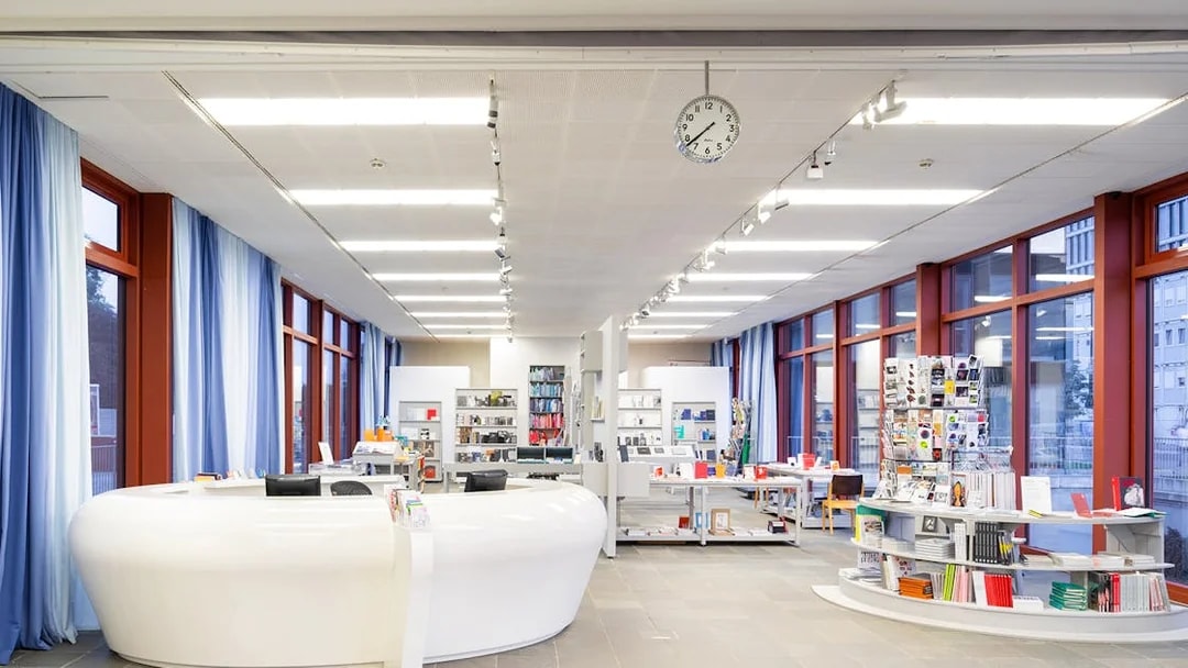 Museum gift shop at Belvedere 21, Vienna, with books and souvenirs displayed.