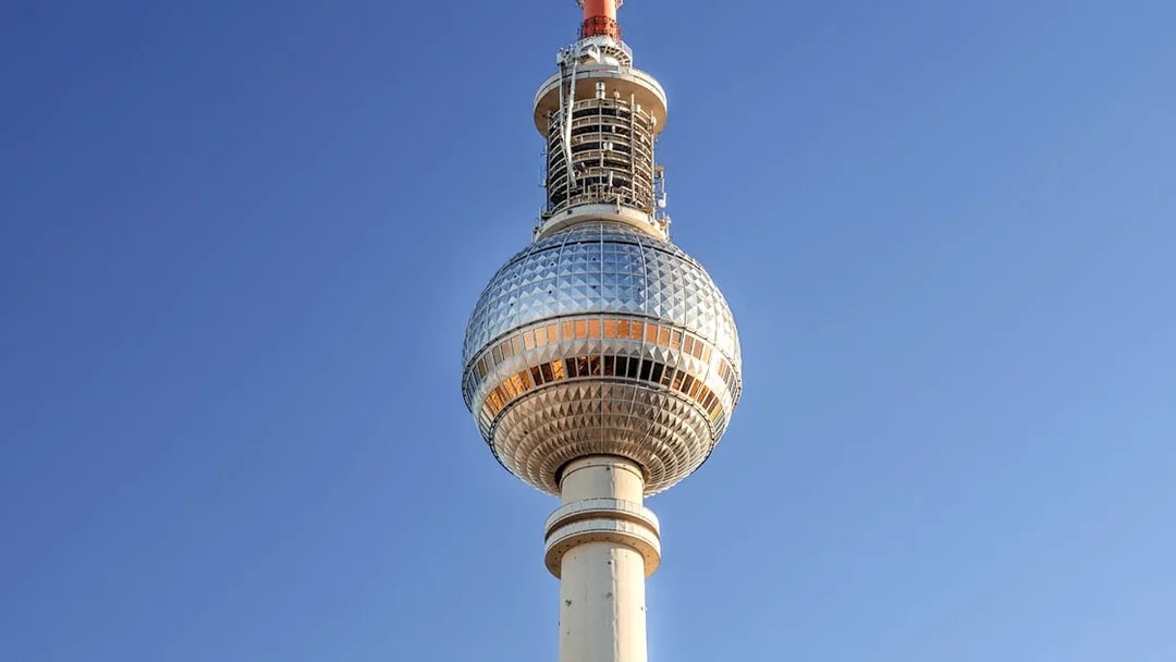 Berlin TV Tower against clear blue sky, Berlin, Germany.