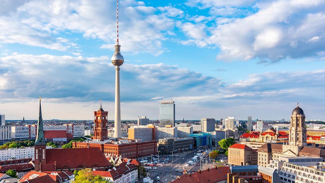 Berlin cityscape featuring the Berlin TV Tower and surrounding architecture.