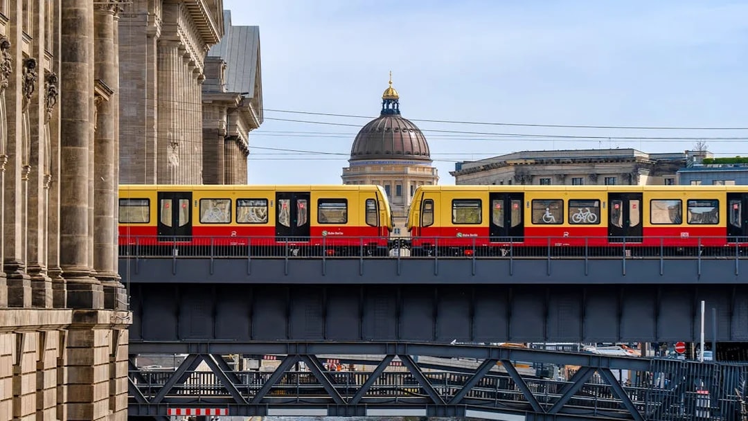 S-Bahn train crossing a bridge on Museum Island, Berlin.