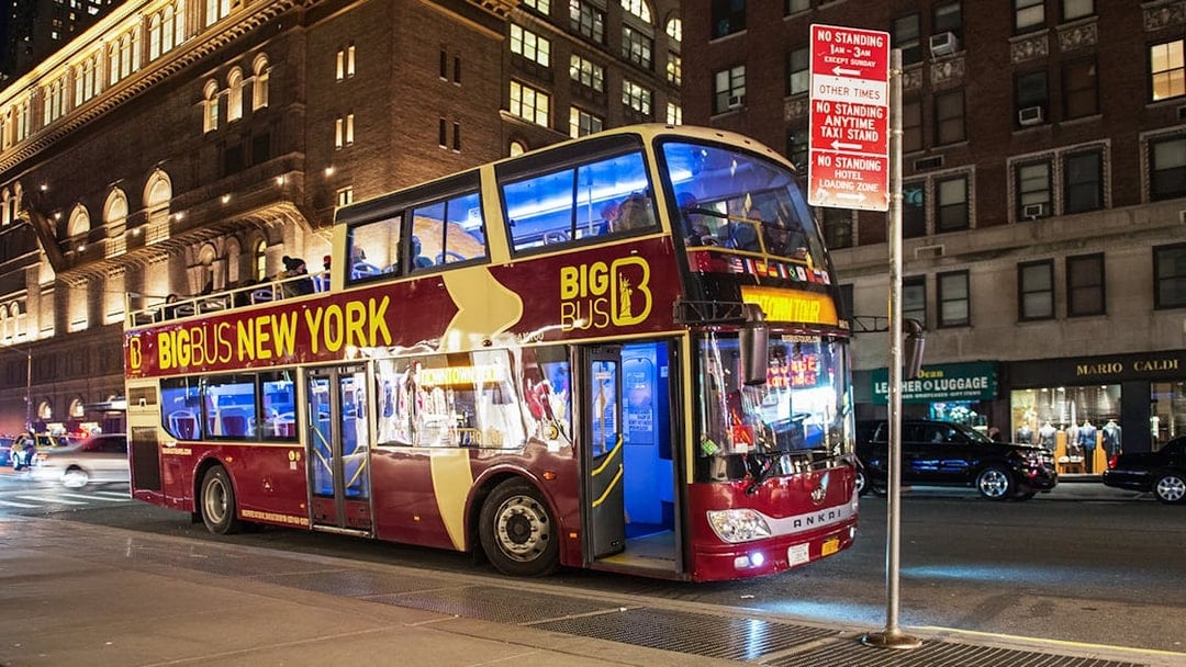 Big Bus at a New York City bus stop during the night tour.