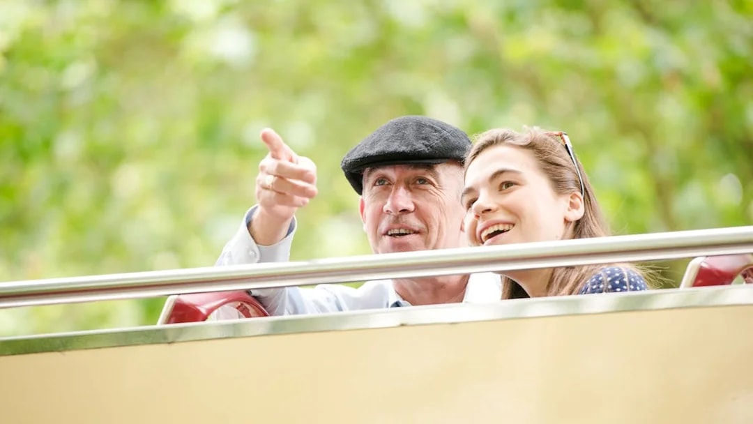 Family enjoying view from Big Bus hop on hop off tour.