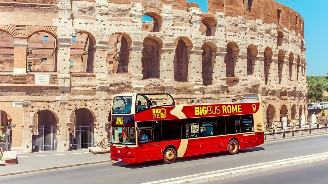 Big Bus tour near the Colosseum in Rome, Italy.