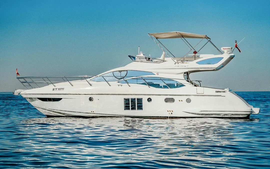Luxury yacht cruising on the waters of Dubai.