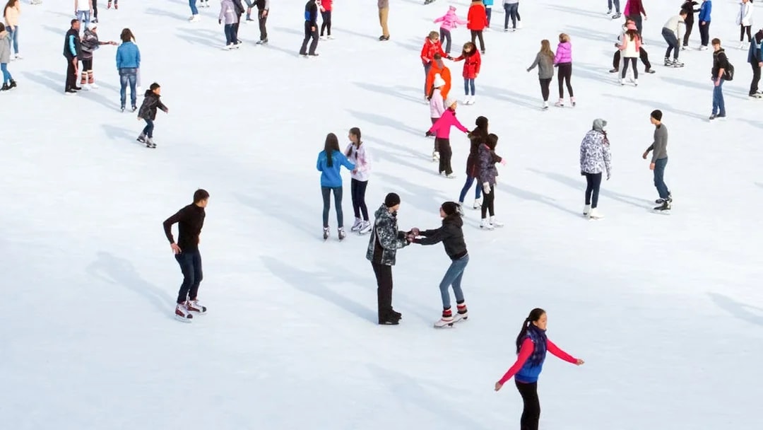 People ice skating at Blue Ice Snow Park, Johor Bahru.