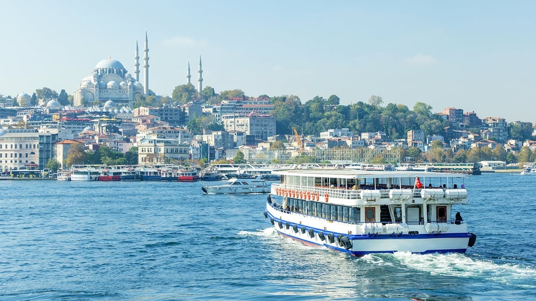 Bosphorus cruise with view of Istanbul's Blue Mosque in the background.