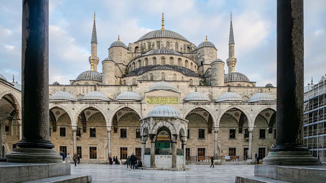 Blue Mosque courtyard with central fountain and domes, Istanbul.