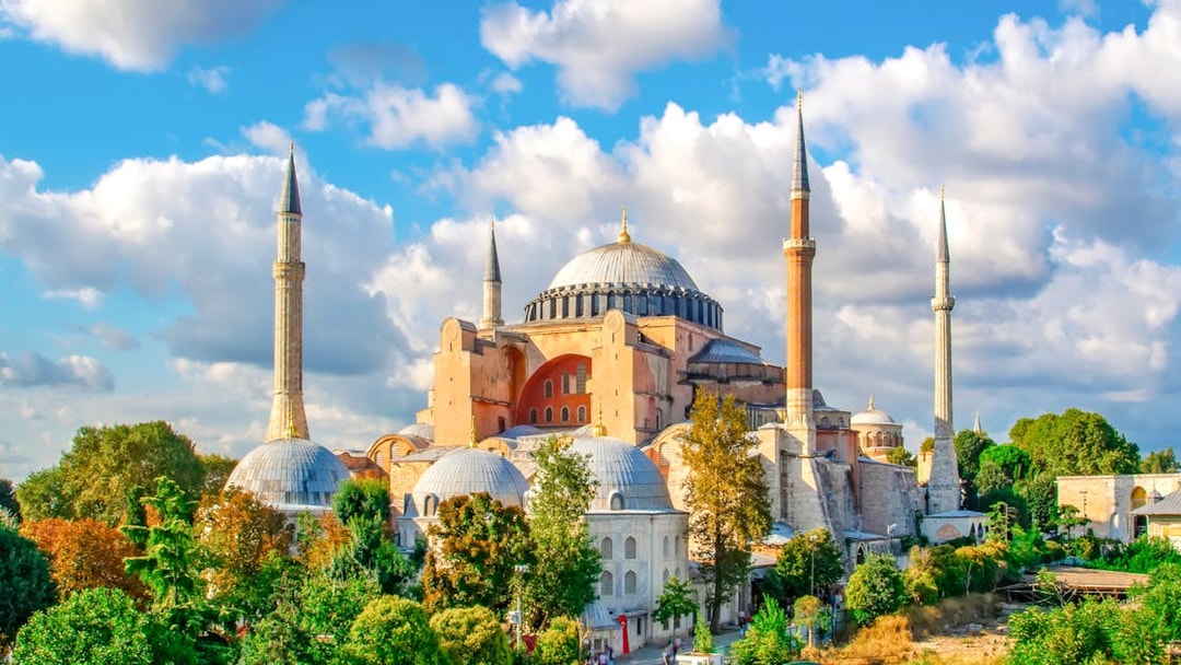 Hagia Sophia exterior with minarets and domes in Istanbul, Turkey.