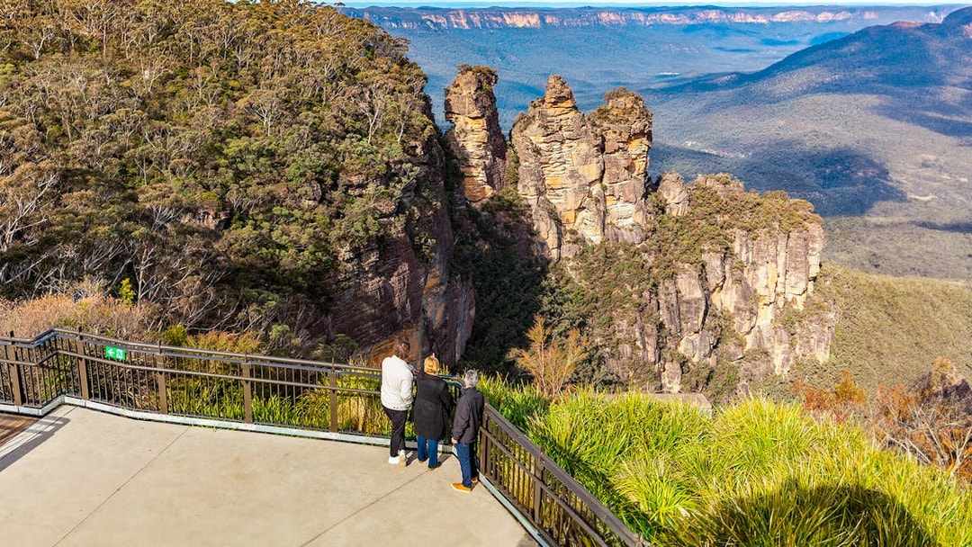 Visitors at Echo Point viewing the Three Sisters rock formation, Blue Mountains, Australia.