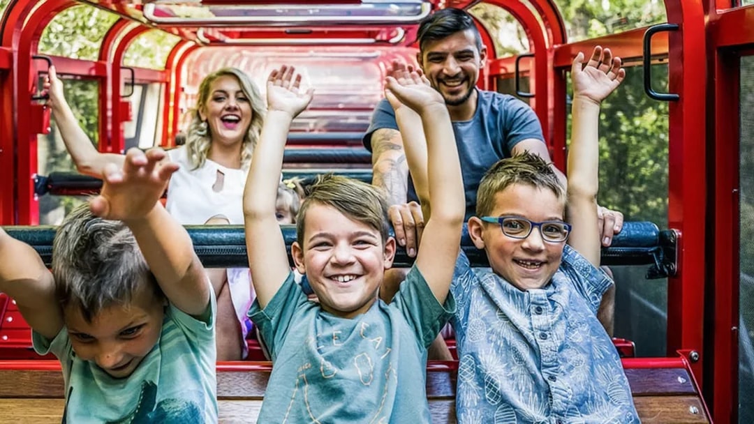 Family enjoying a ride on the forest railway at Scenic World, Blue Mountains.