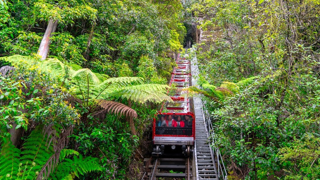 Railway descending through lush forest at Blue Mountains, Sydney.
