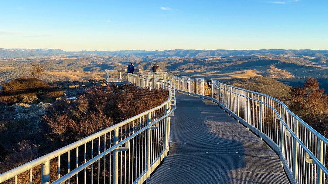 Boardwalk at Scenic World overlooking Blue Mountains landscape.