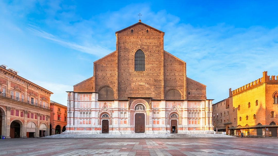 Basilica of San Petronio in Bologna, Italy, with surrounding historic buildings.