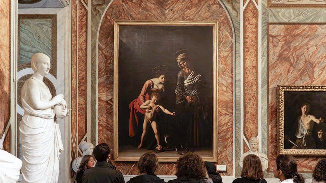 Visitors viewing Caravaggio paintings in Borghese Gallery, Rome.