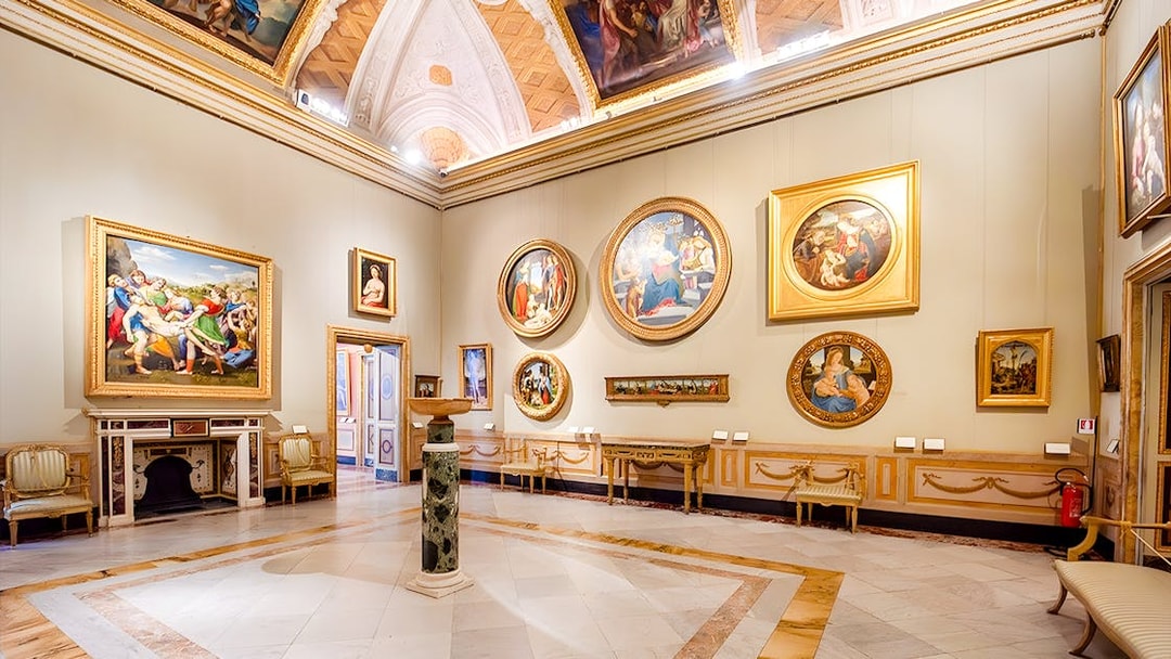 Borghese Gallery interior with classical paintings and ornate ceiling.