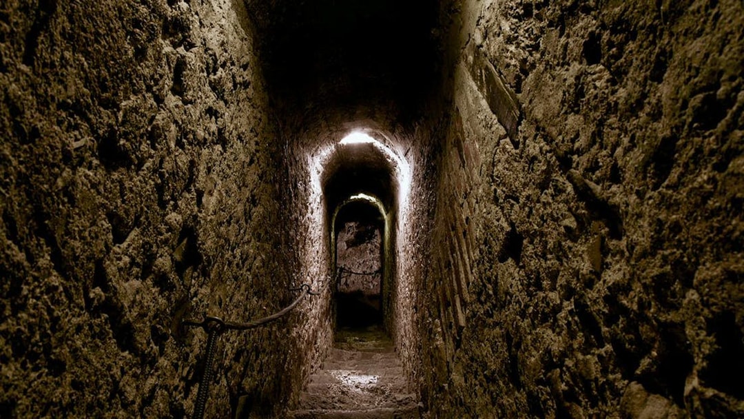 Narrow stone corridor inside Bran Castle, Romania.
